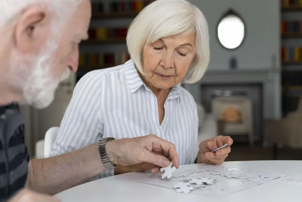 Caregiver assisting with cognitive exercises