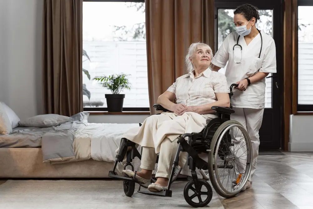 Senior woman smiling with her compassionate nurse
